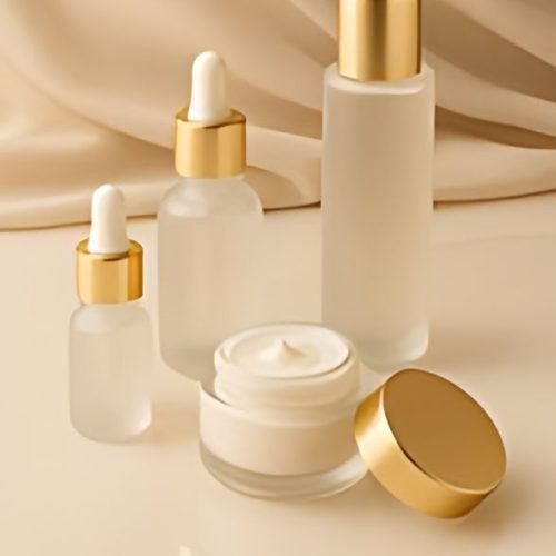 luxury skincare collection with serum, toner, and cream on elegant beige background